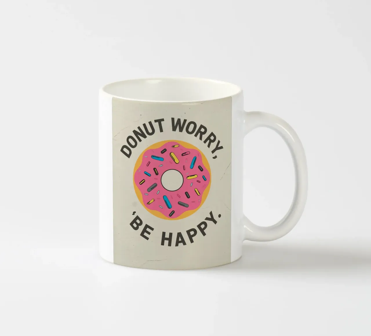 Ciambella con "Donut Worry Be Happy" (Non preoccuparti, sii felice) tazza in ceramica da DesignDoodle