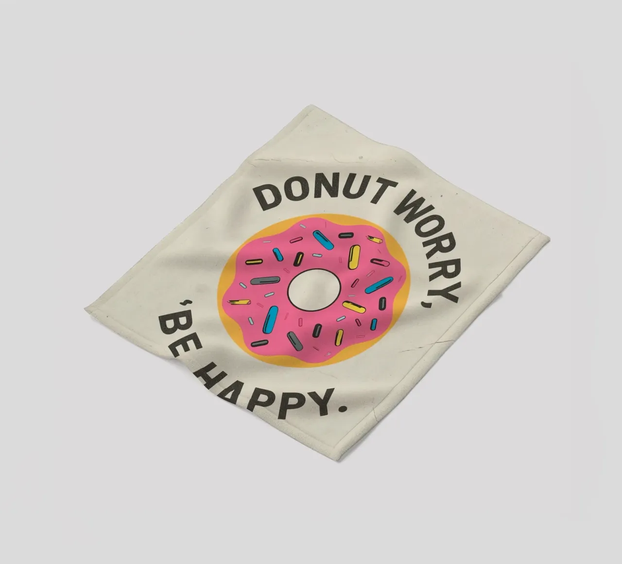 Ciambella con "Donut Worry Be Happy" (Non preoccuparti, sii felice) coperta in pile da DesignDoodle