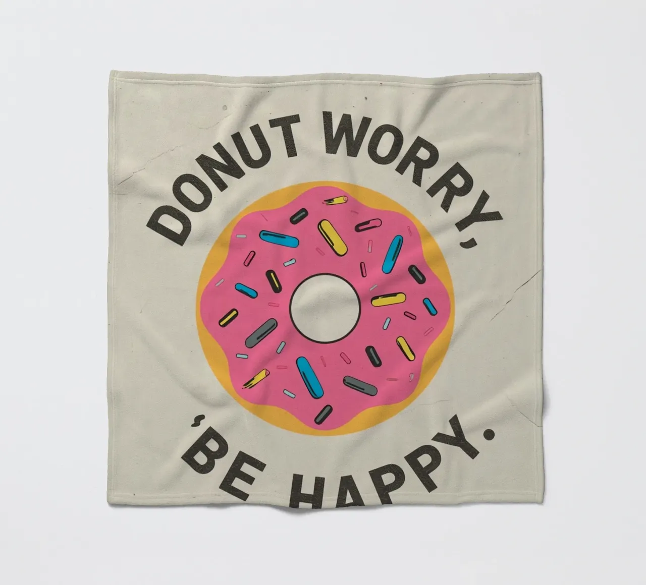 Ciambella con "Donut Worry Be Happy" (Non preoccuparti, sii felice) coperta in pile da DesignDoodle