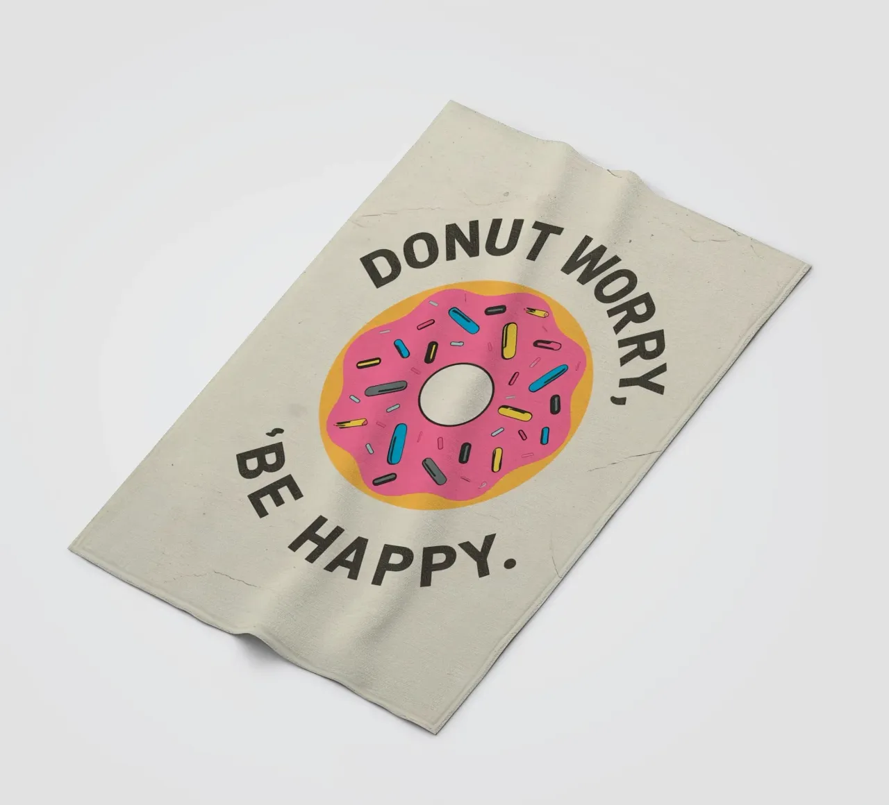 Ciambella con "Donut Worry Be Happy" (Non preoccuparti, sii felice) coperta in pile da DesignDoodle