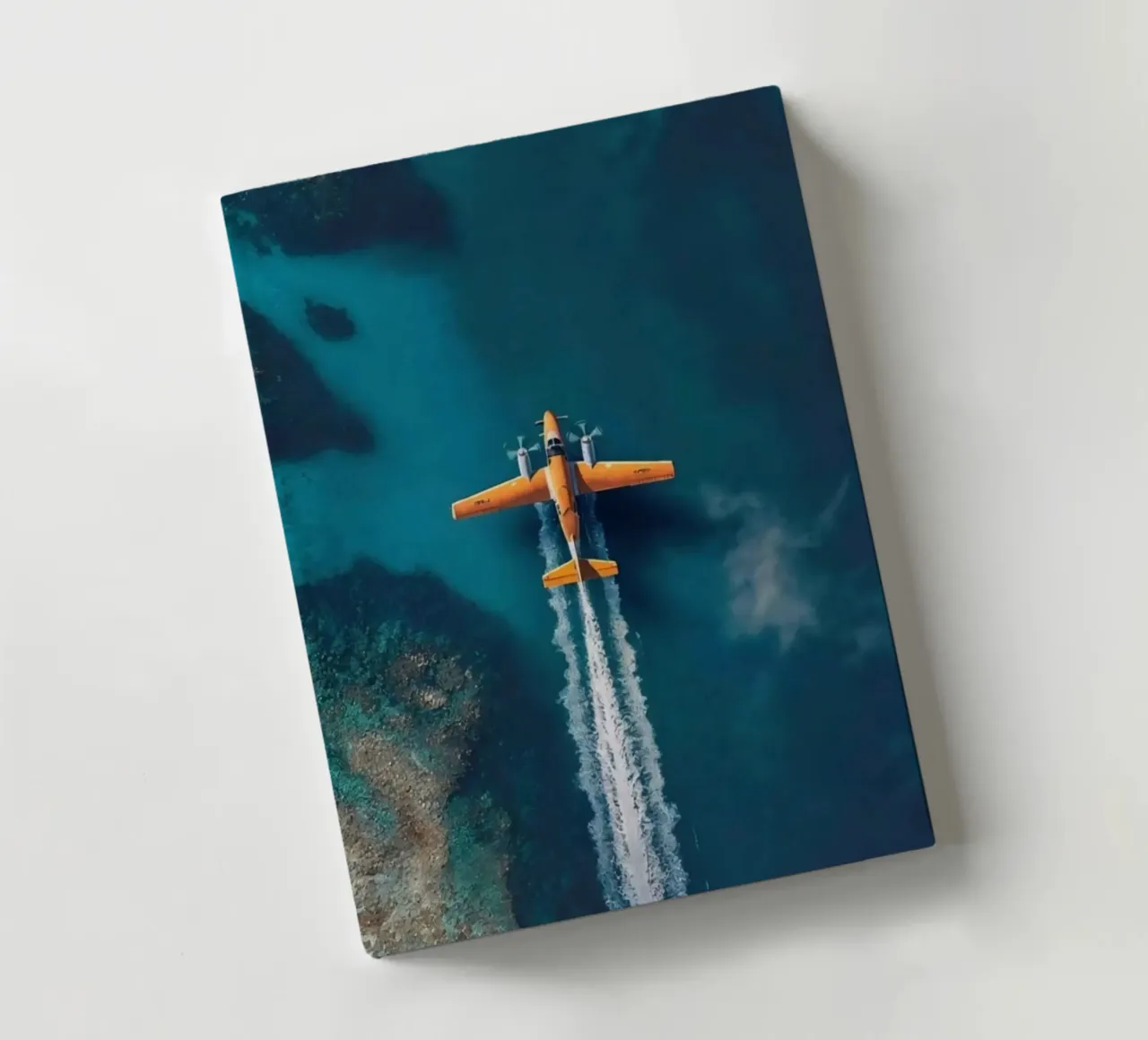 plane slide on water notebook by Fost