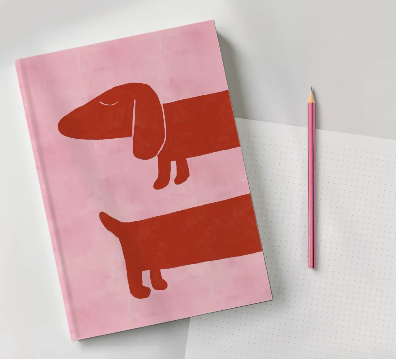 Two Dachshunds on Pink Background notebook by Tory