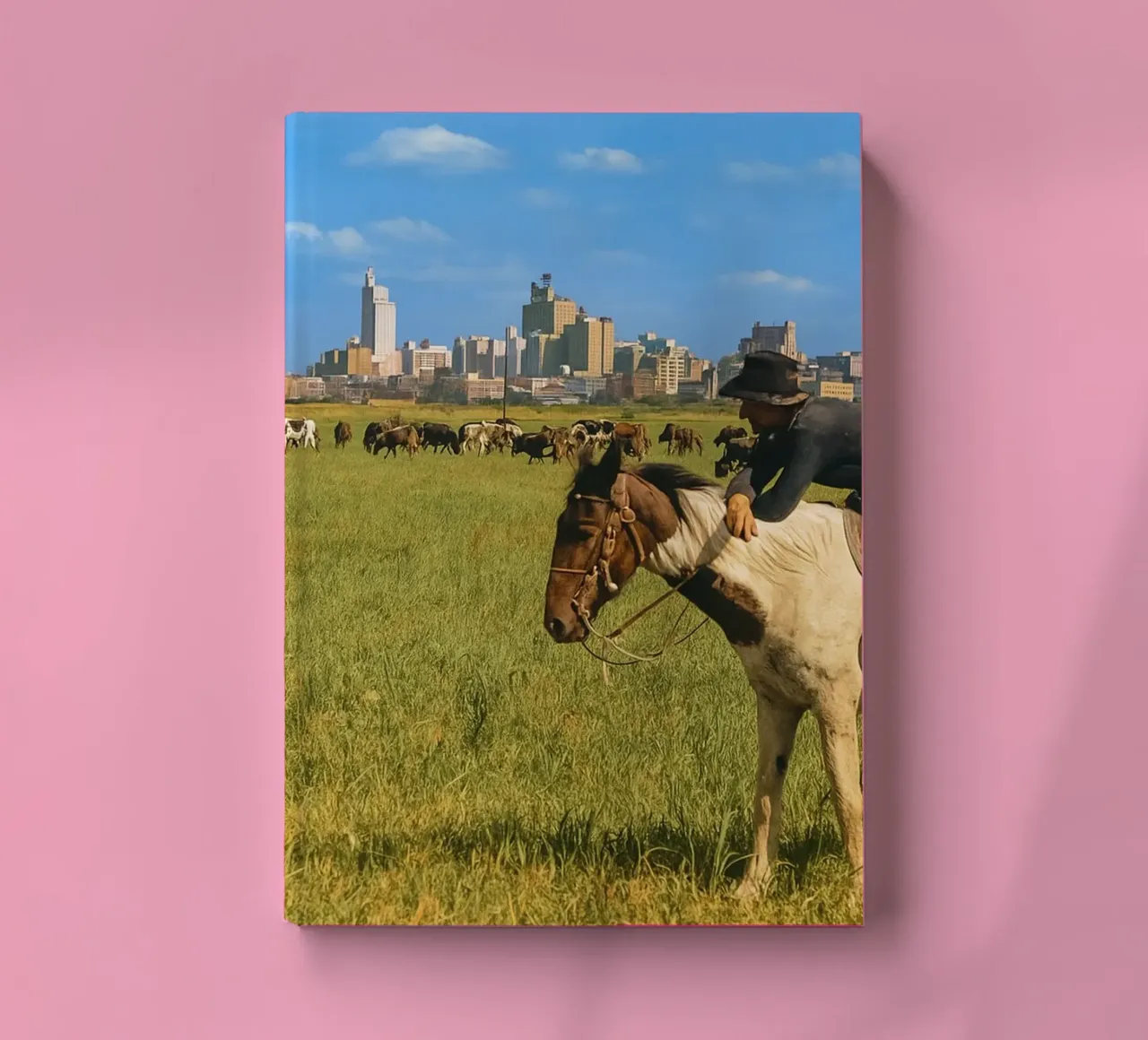 young man herding cows in the meadow notebook by tamarind