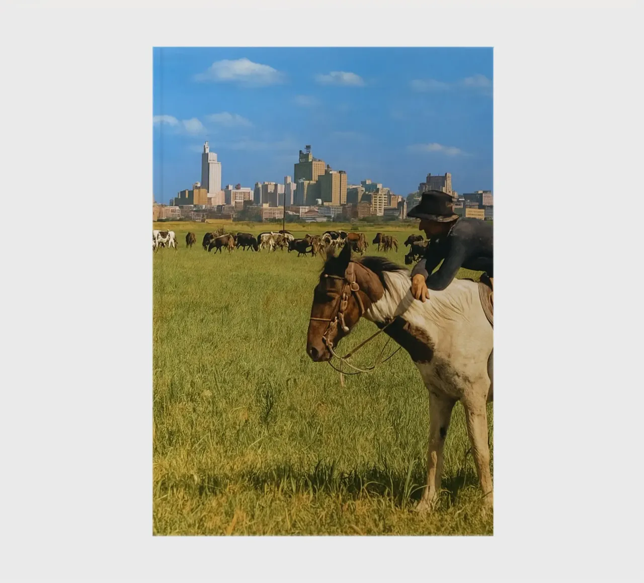 young man herding cows in the meadow notebook by tamarind