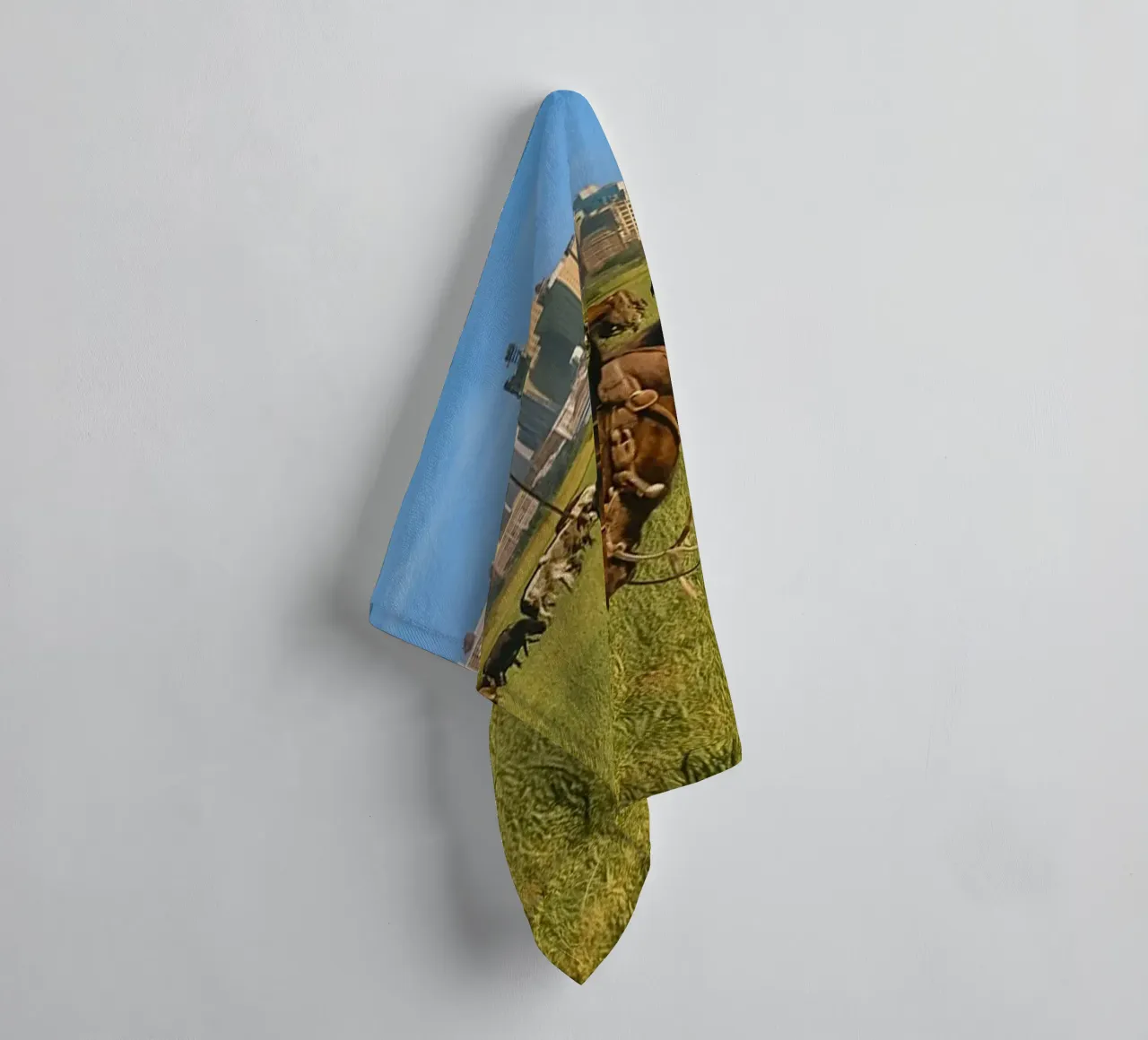 young man herding cows in the meadow towel by tamarind