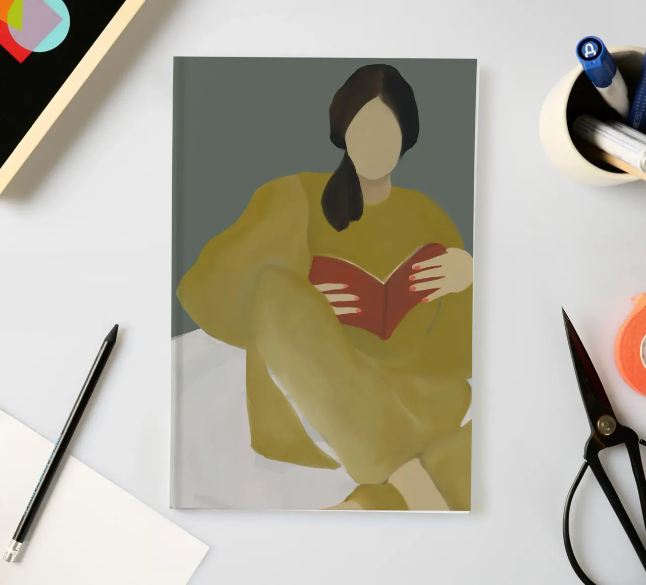couch reading notebook by XOXO Arte