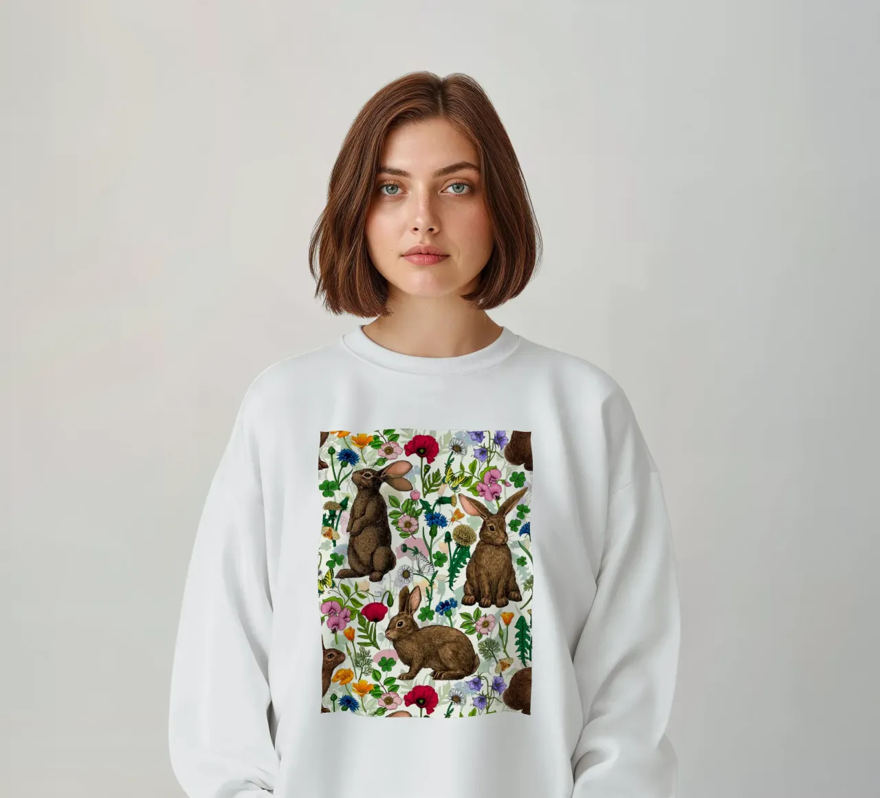 Conigli e fiori selvatici felpa da Painted Nature