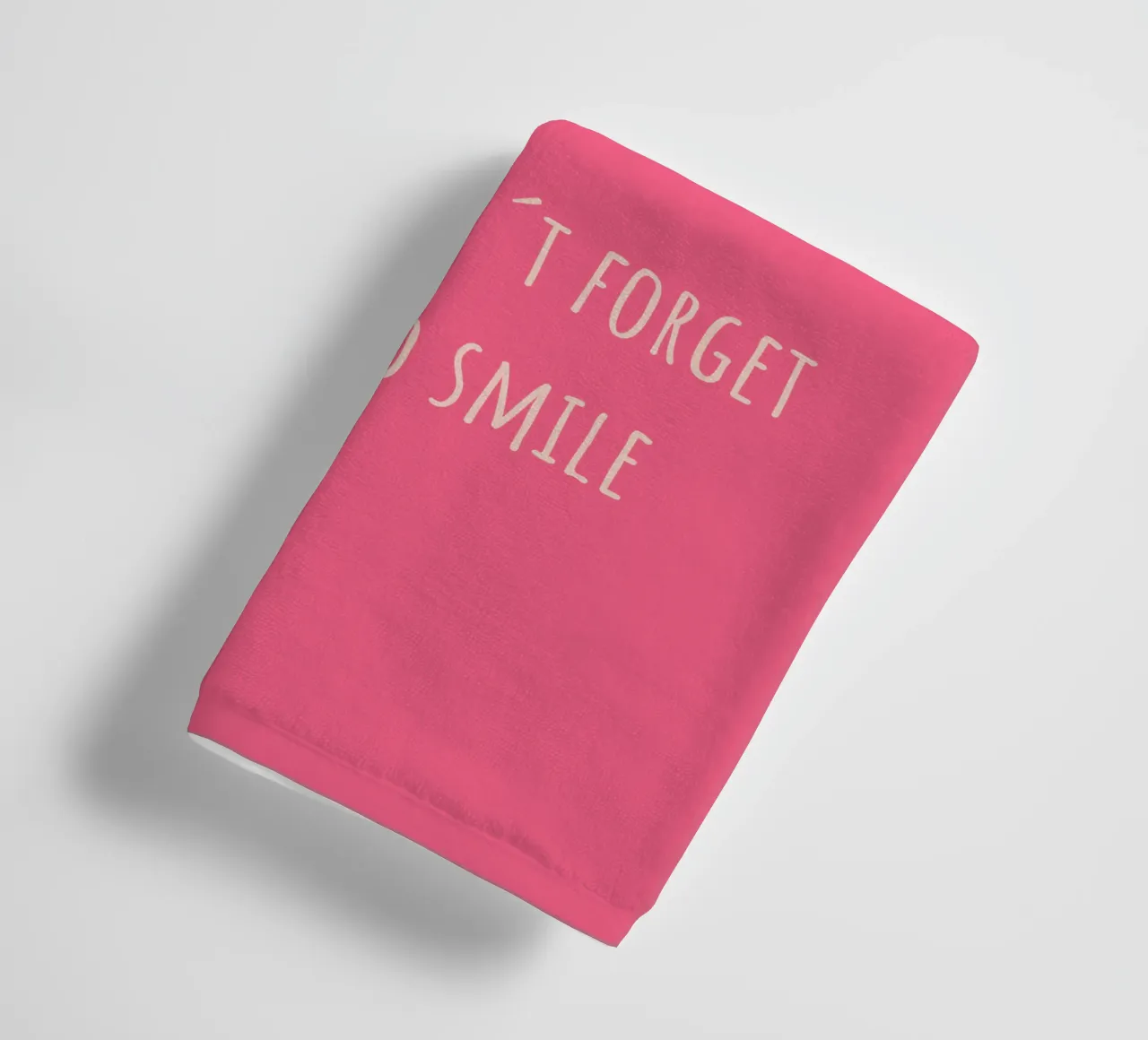 Pink background with saying Don't forget to smile towel by Something for you