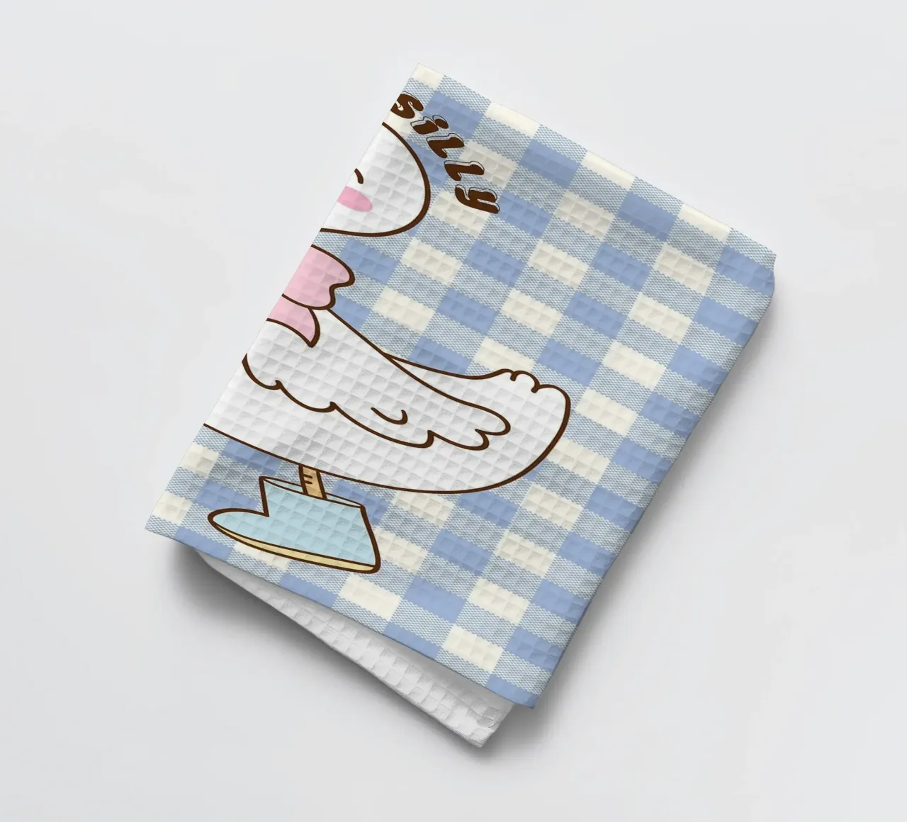 Simpática ilustración de un pato con botas y lazo paño de cocina de Tory