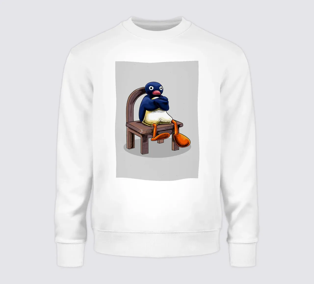 Pingu seduto sulla sedia felpa da bazi