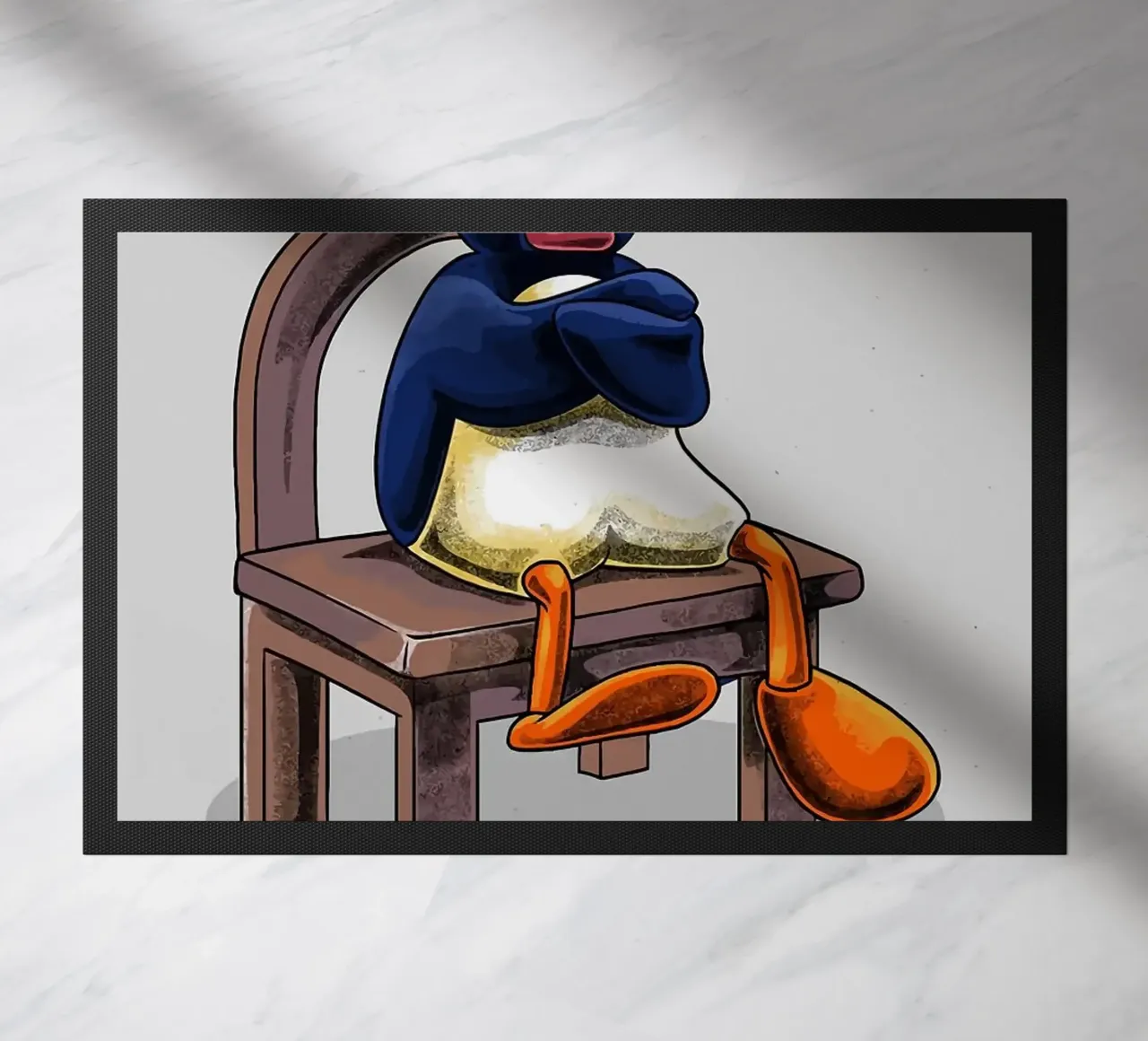Pingu seduto sulla sedia zerbino da bazi