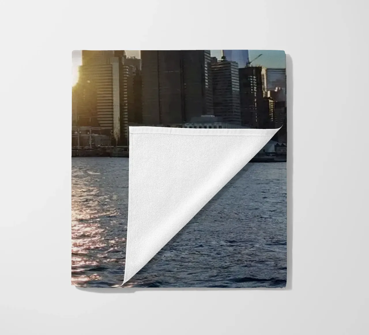 Lo skyline di New York al tramonto telo mare da DiveDuke