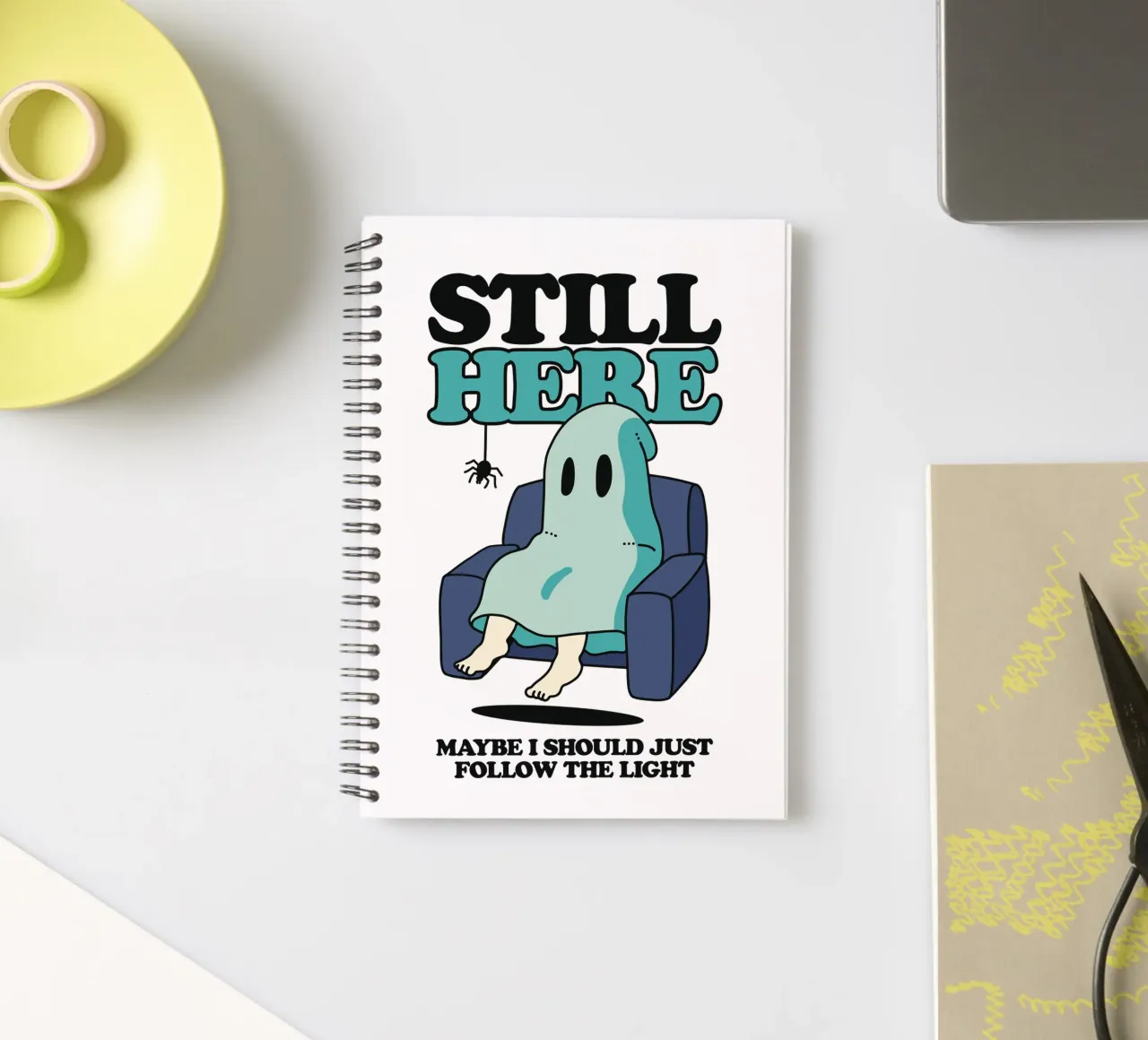 A ghost on the sofa spiral notebook by TeeLab
