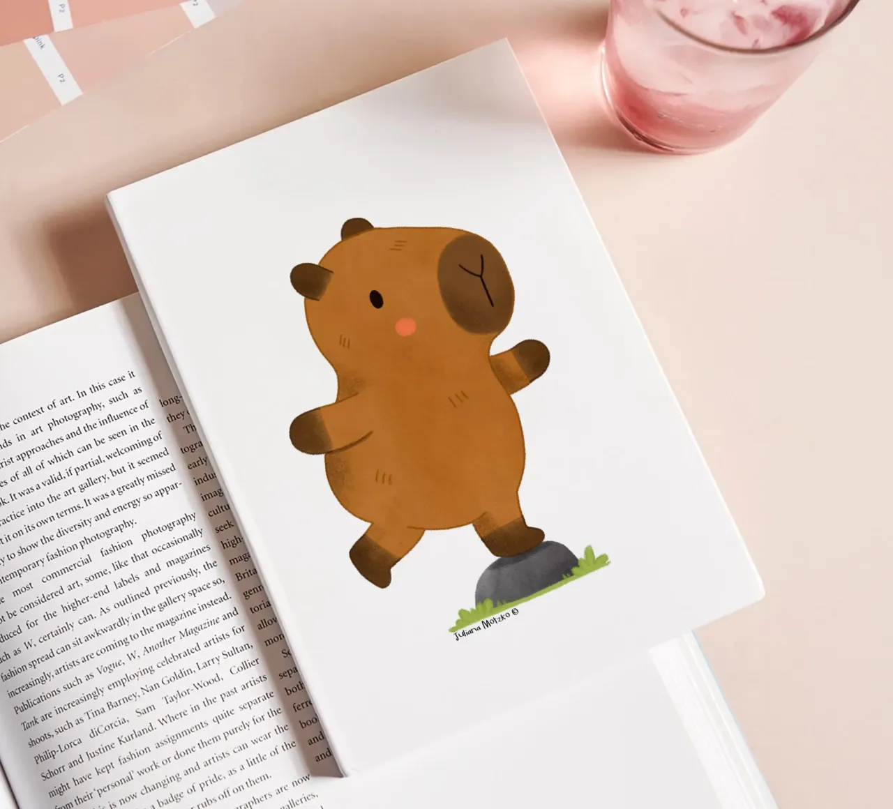 Capybara balancing notebook by julianamotzko