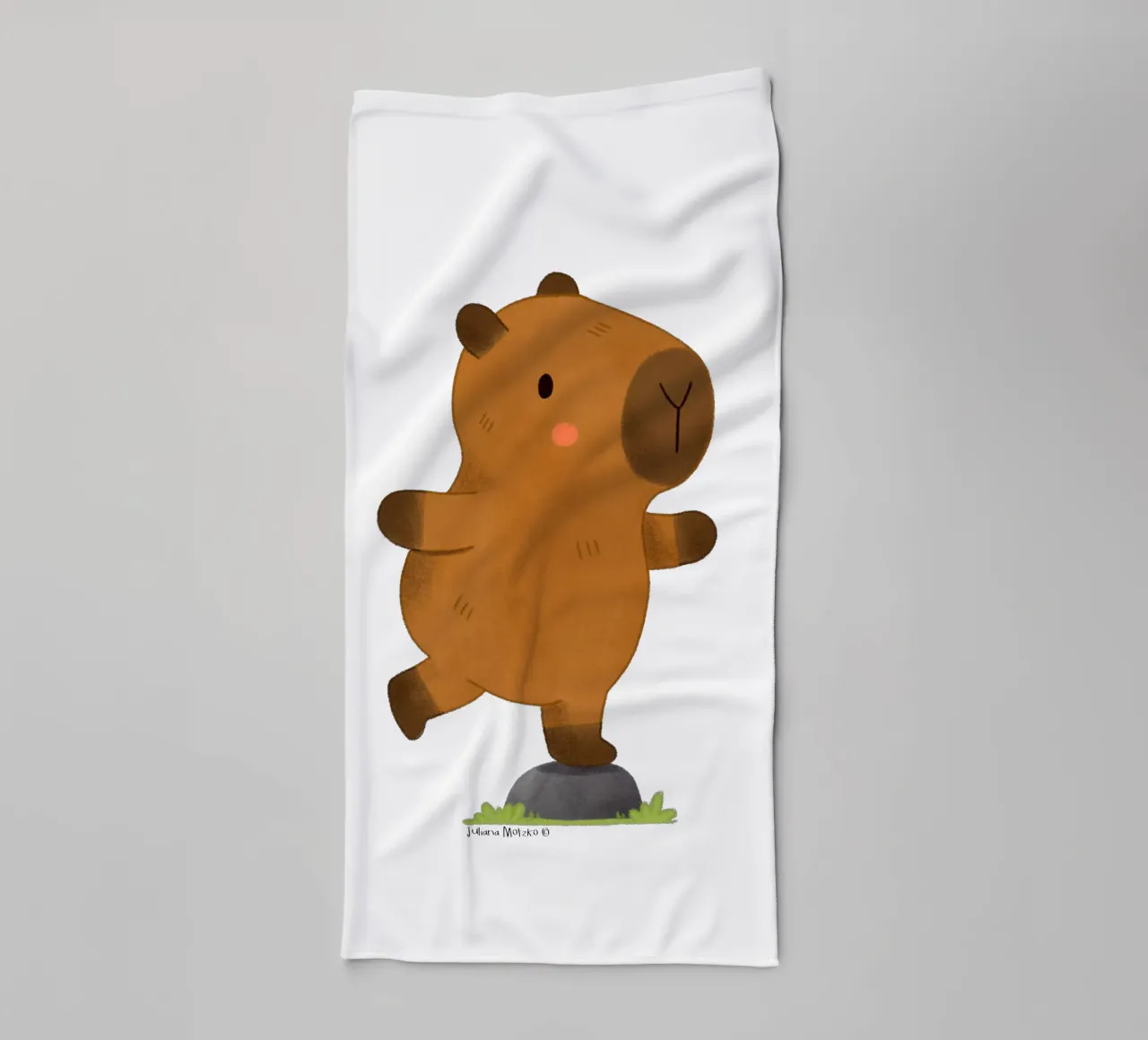 Capybara balancing towel by julianamotzko