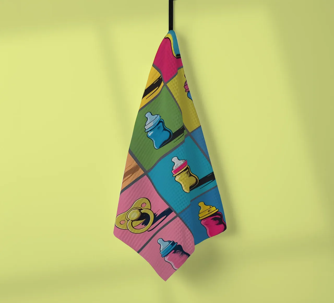 Biberons et sucettes dans une grille de présentation torchon de DesignDoodle