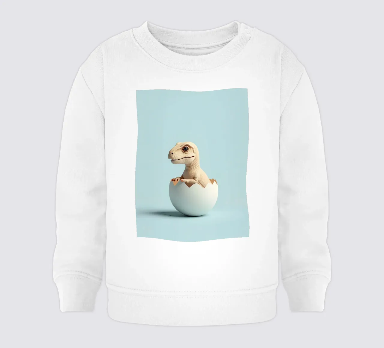 Simpática cría de dinosaurio saliendo de un huevo sudadera de bebé de DesignDoodle