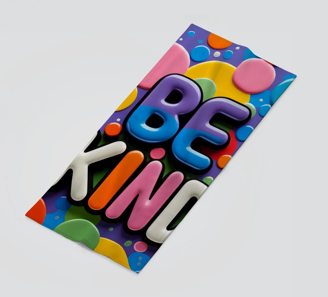 Testo BE KIND con forme colorate telo mare da DesignDoodle