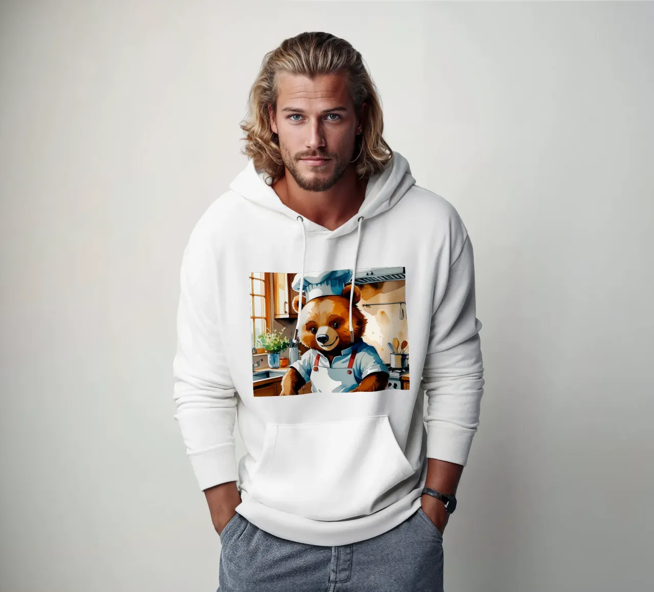 Orso chef che prepara una torta in cucina felpa con cappuccio da DesignDoodle