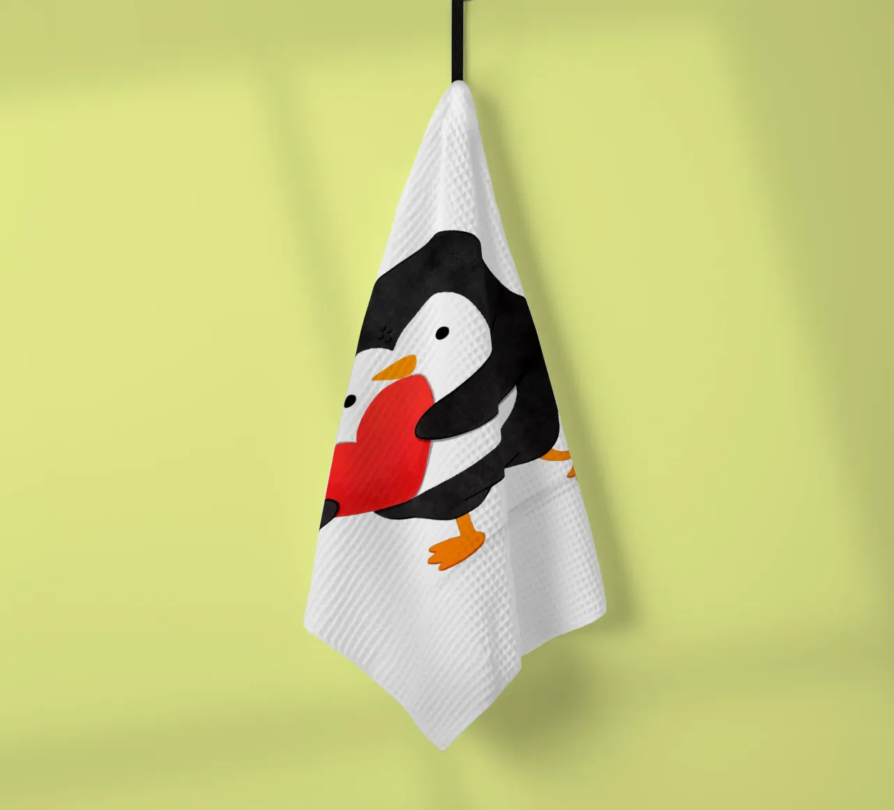 Penguin holding a big red heart canovaccio da cucina da julianamotzko