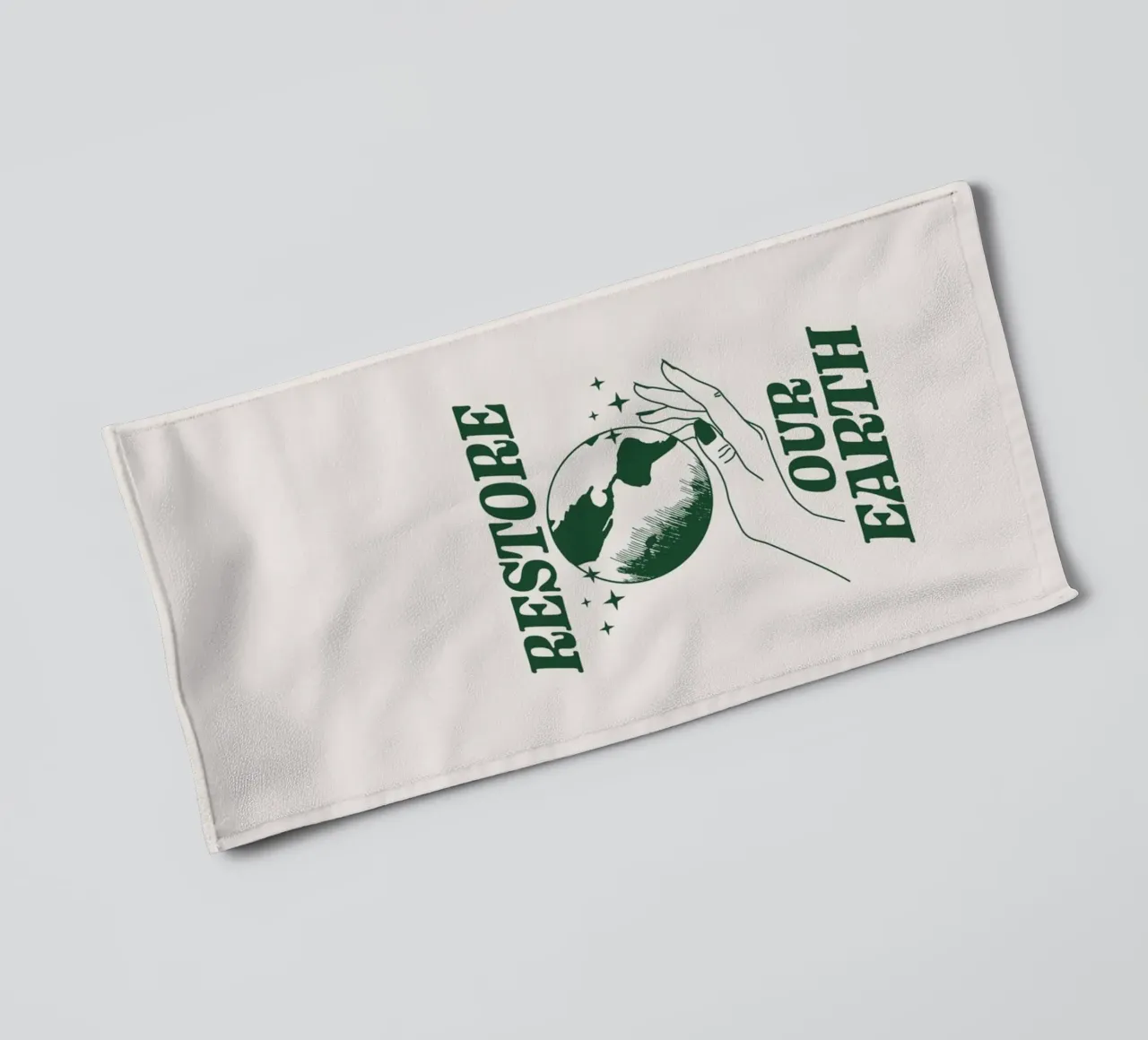 Herstel onze aarde badhanddoek van Eco Rebel Creative
