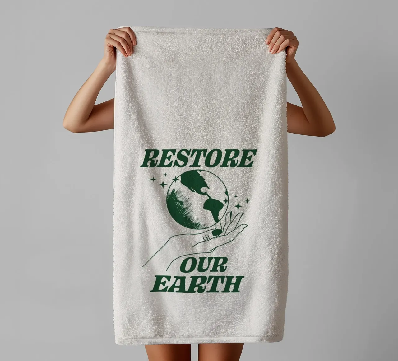 Herstel onze aarde badhanddoek van Eco Rebel Creative