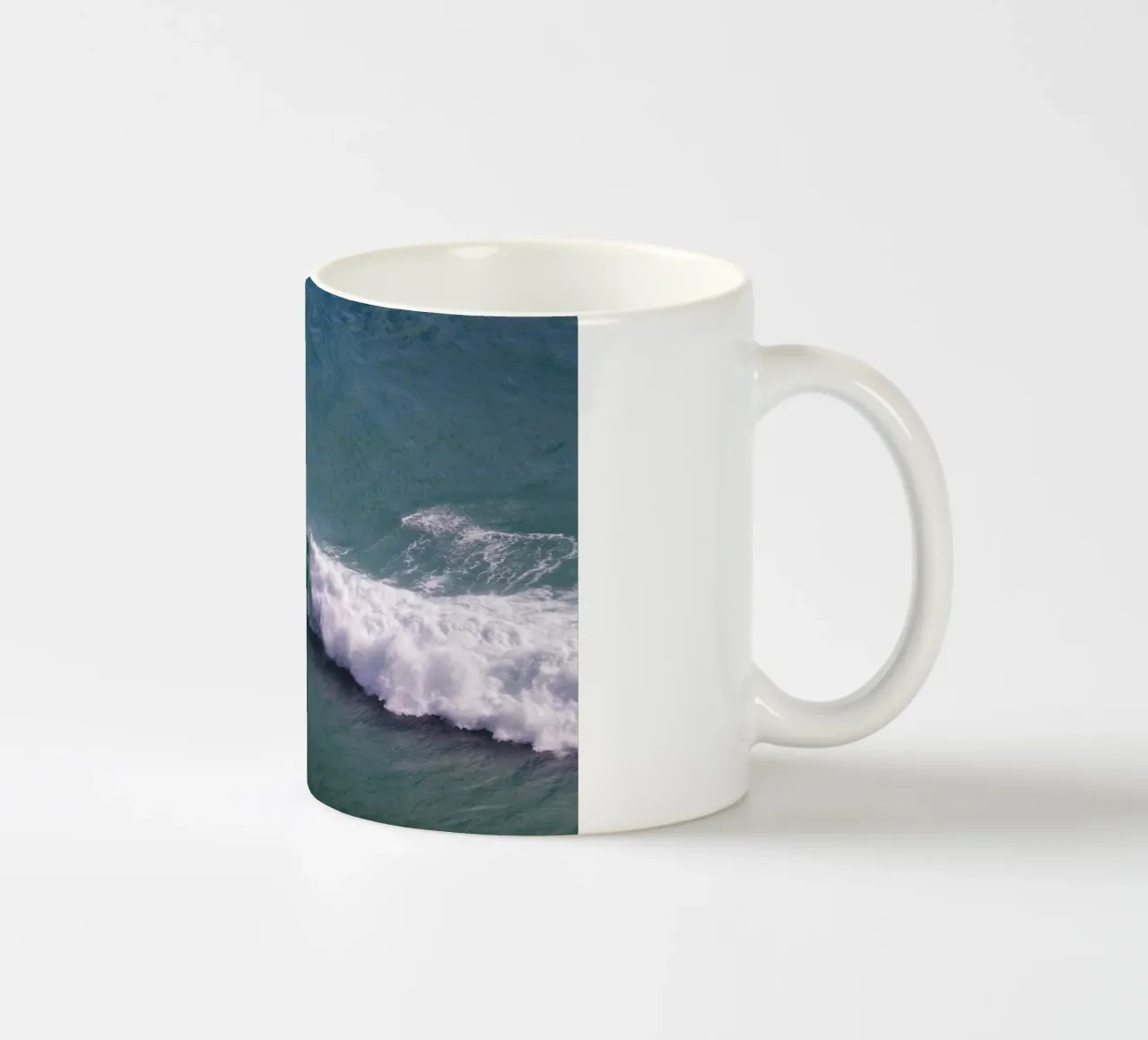 Surfer in Portugal ceramic mug by Fjöllart