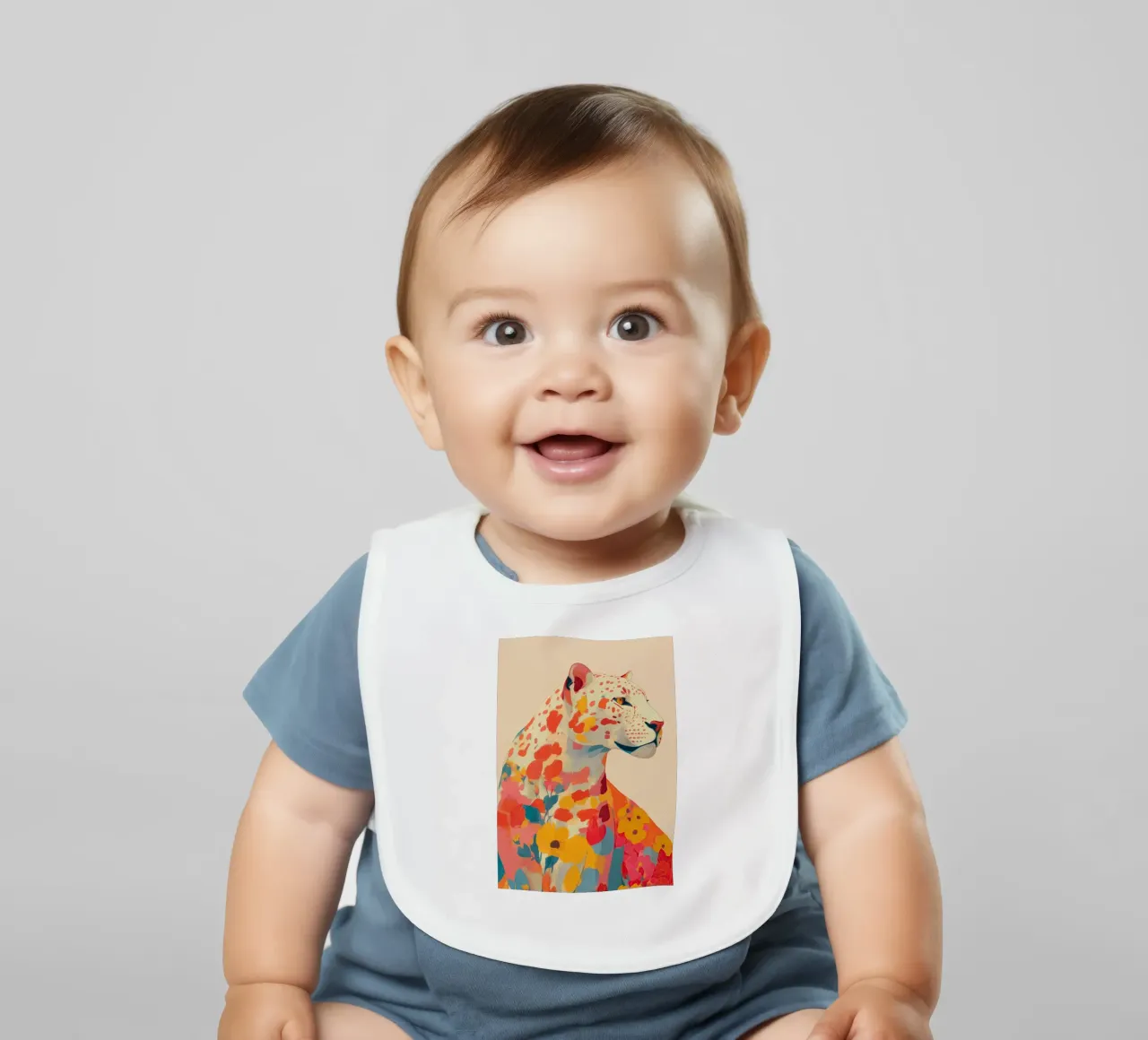 Leopard in Bloom baby bib by Luca