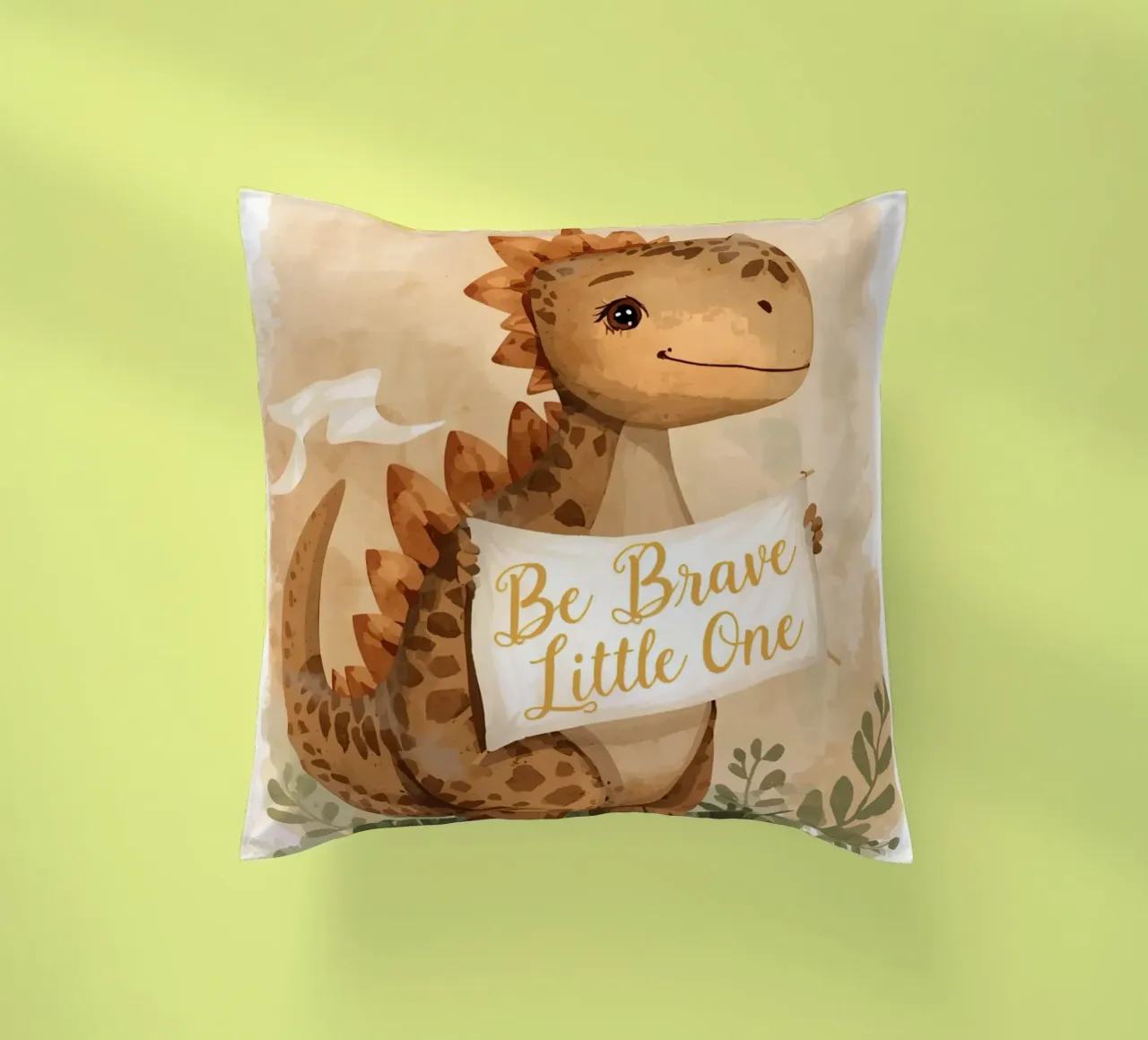Un simpatico dinosauro con in mano lo striscione "Be Brave Little One". cuscino da DesignDoodle