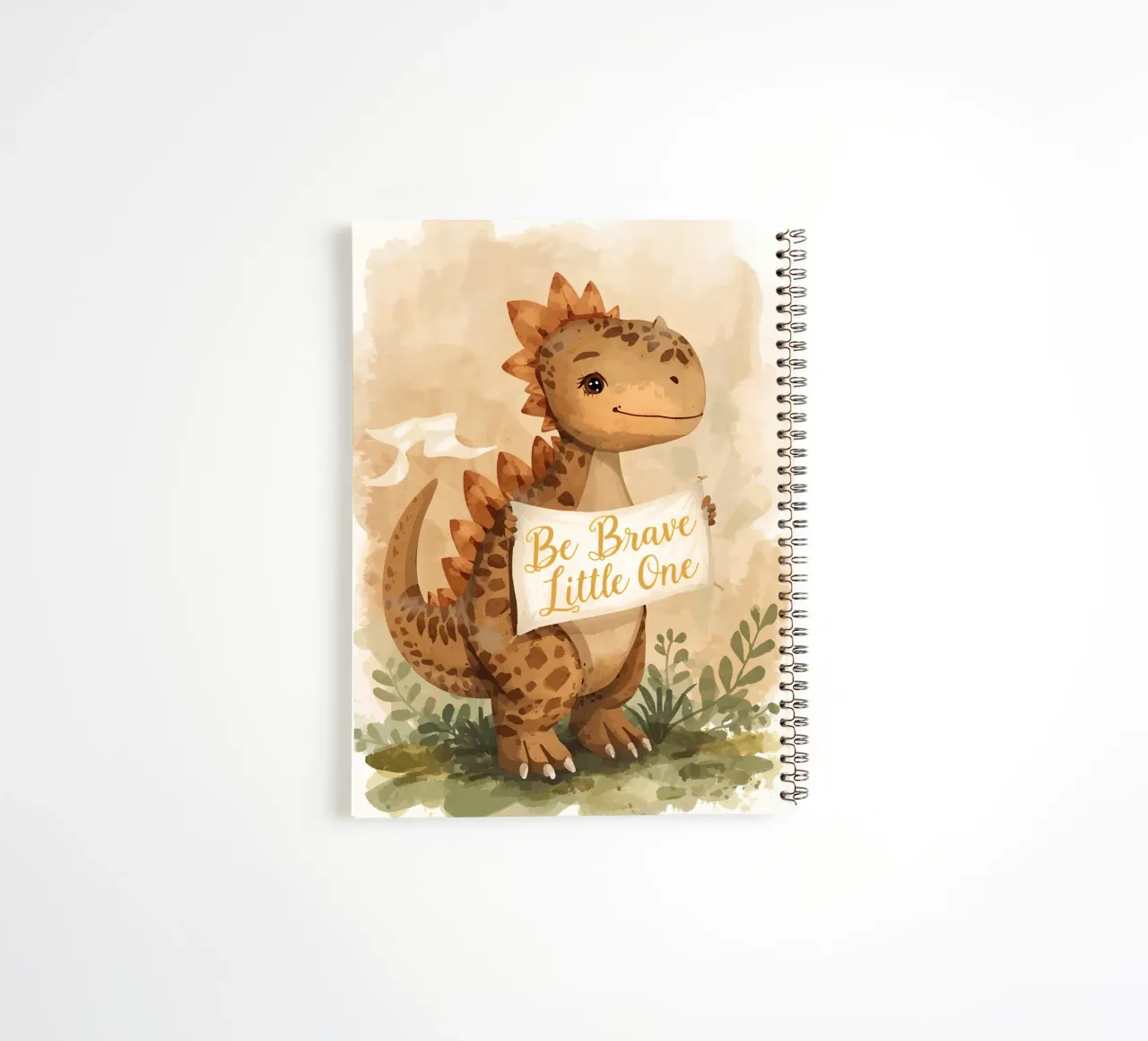 Un simpatico dinosauro con in mano lo striscione "Be Brave Little One". diario ad anelli da DesignDoodle