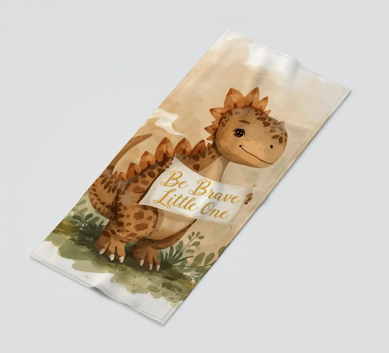 Un simpatico dinosauro con in mano lo striscione "Be Brave Little One". telo mare da DesignDoodle