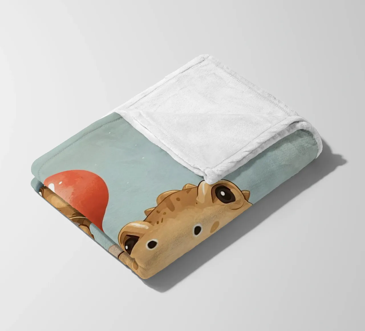 Dinosauro carino con in mano un palloncino rosso coperta in pile da DesignDoodle