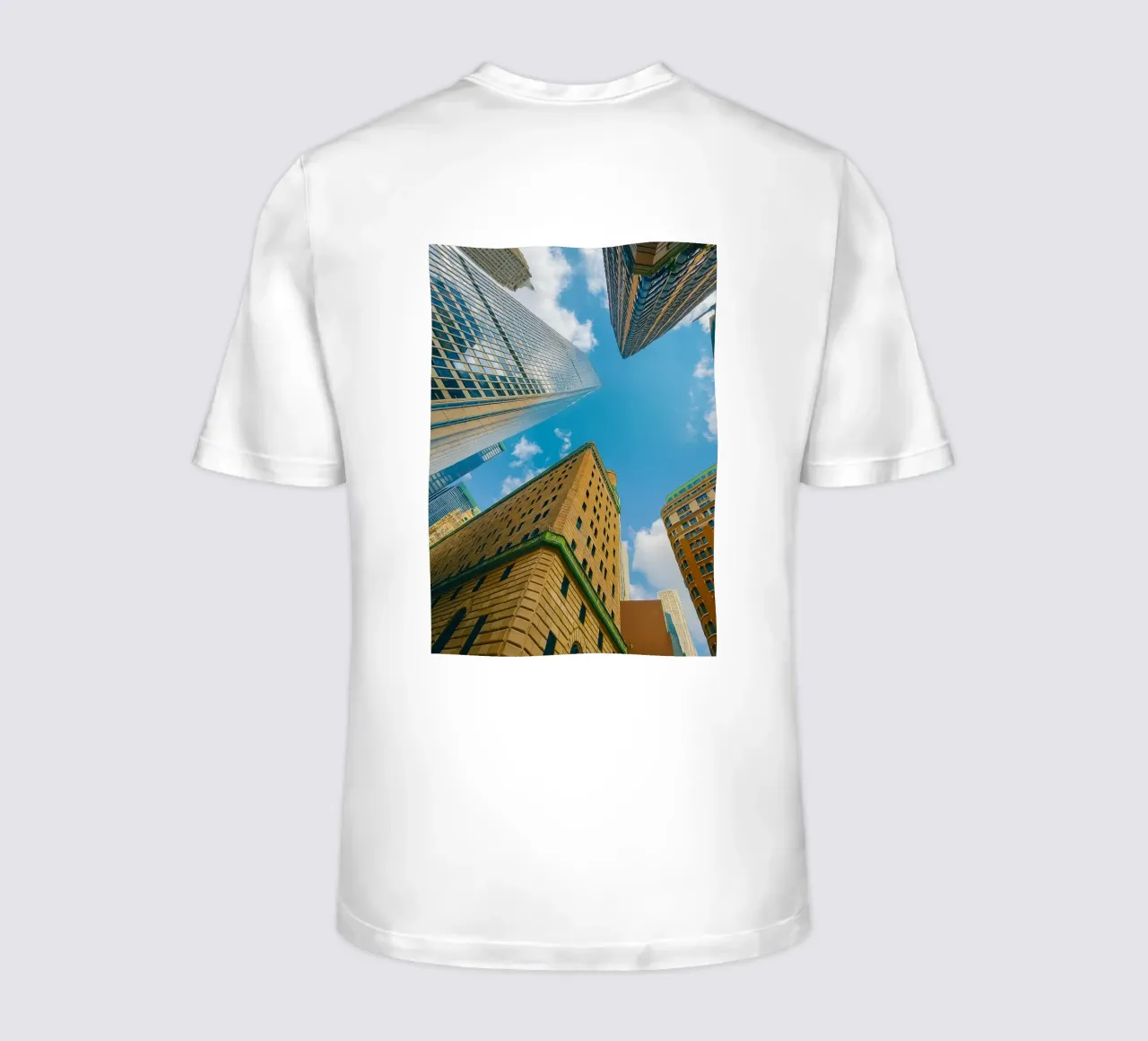view of the sky from under a tall building t-shirt by PASMING