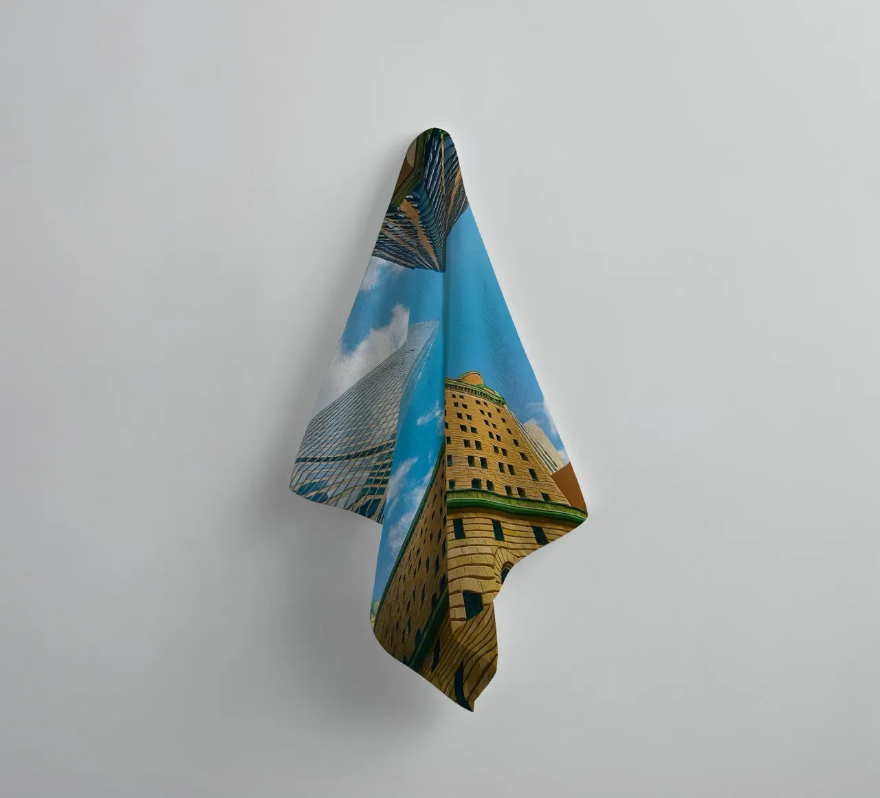 view of the sky from under a tall building towel by PASMING