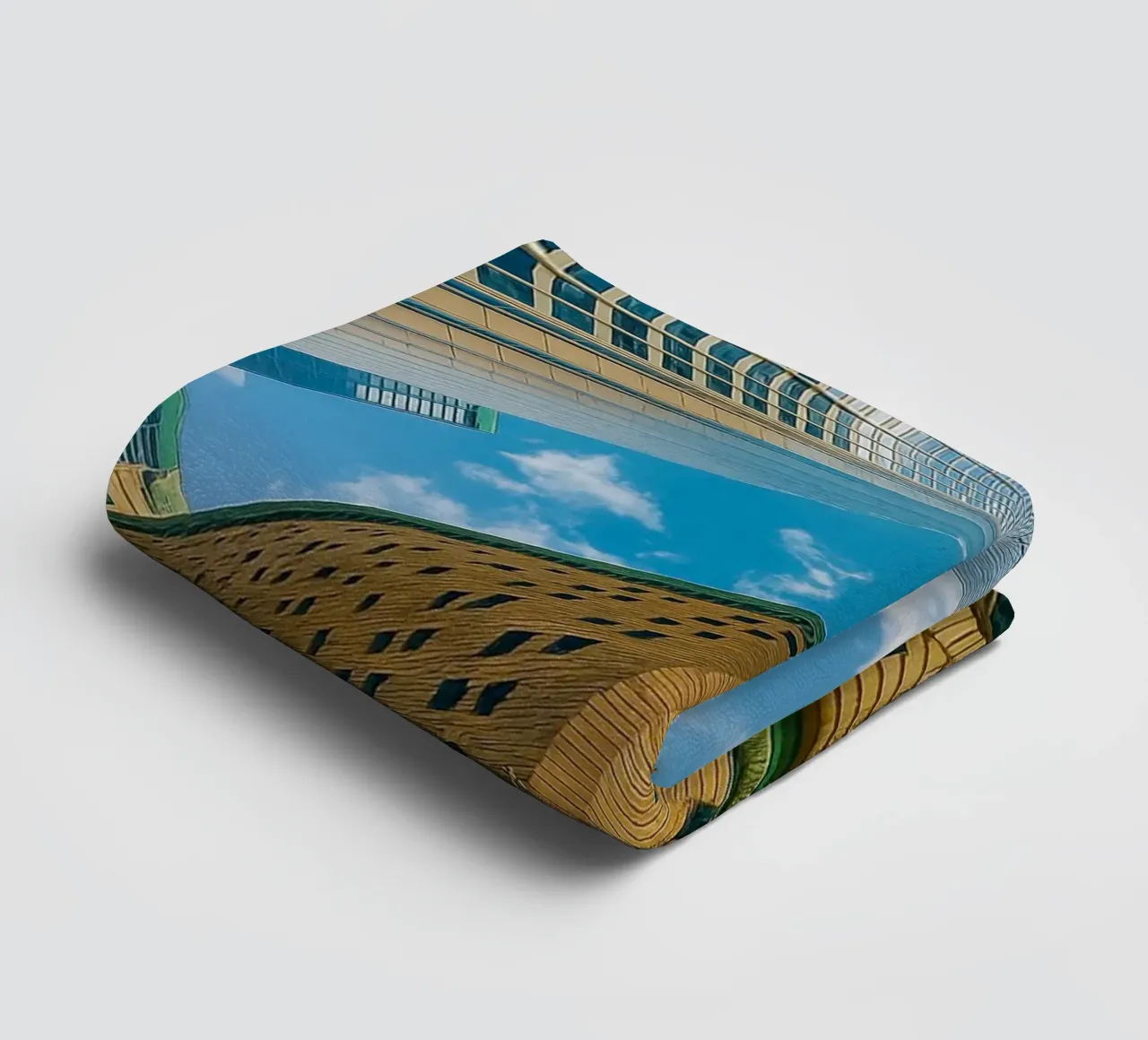 view of the sky from under a tall building towel by PASMING