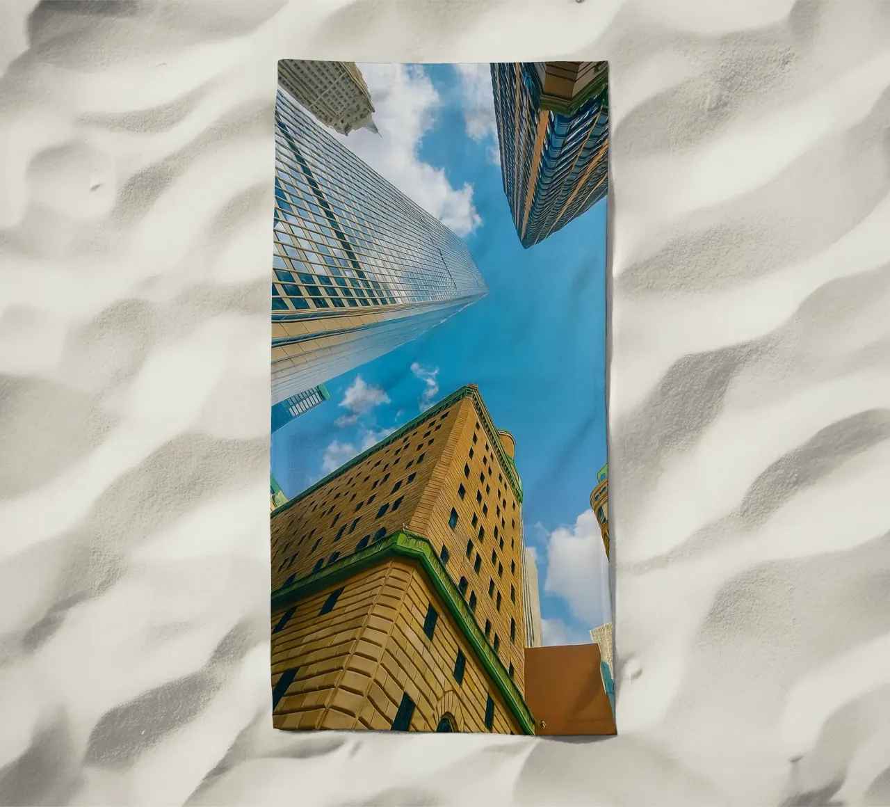 view of the sky from under a tall building beach towel by PASMING