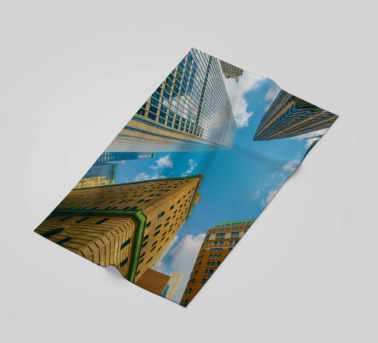view of the sky from under a tall building beach towel by PASMING