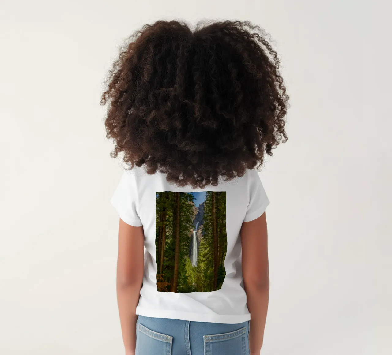 view of a waterfall in the forest kids t-shirt by PASMING