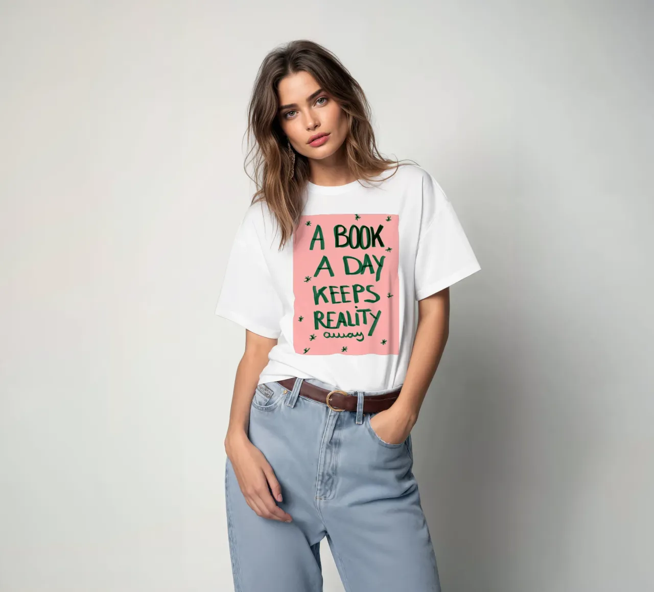 A book a day keeps reality away t-shirt da Hej Ibiza by Ute Arnold