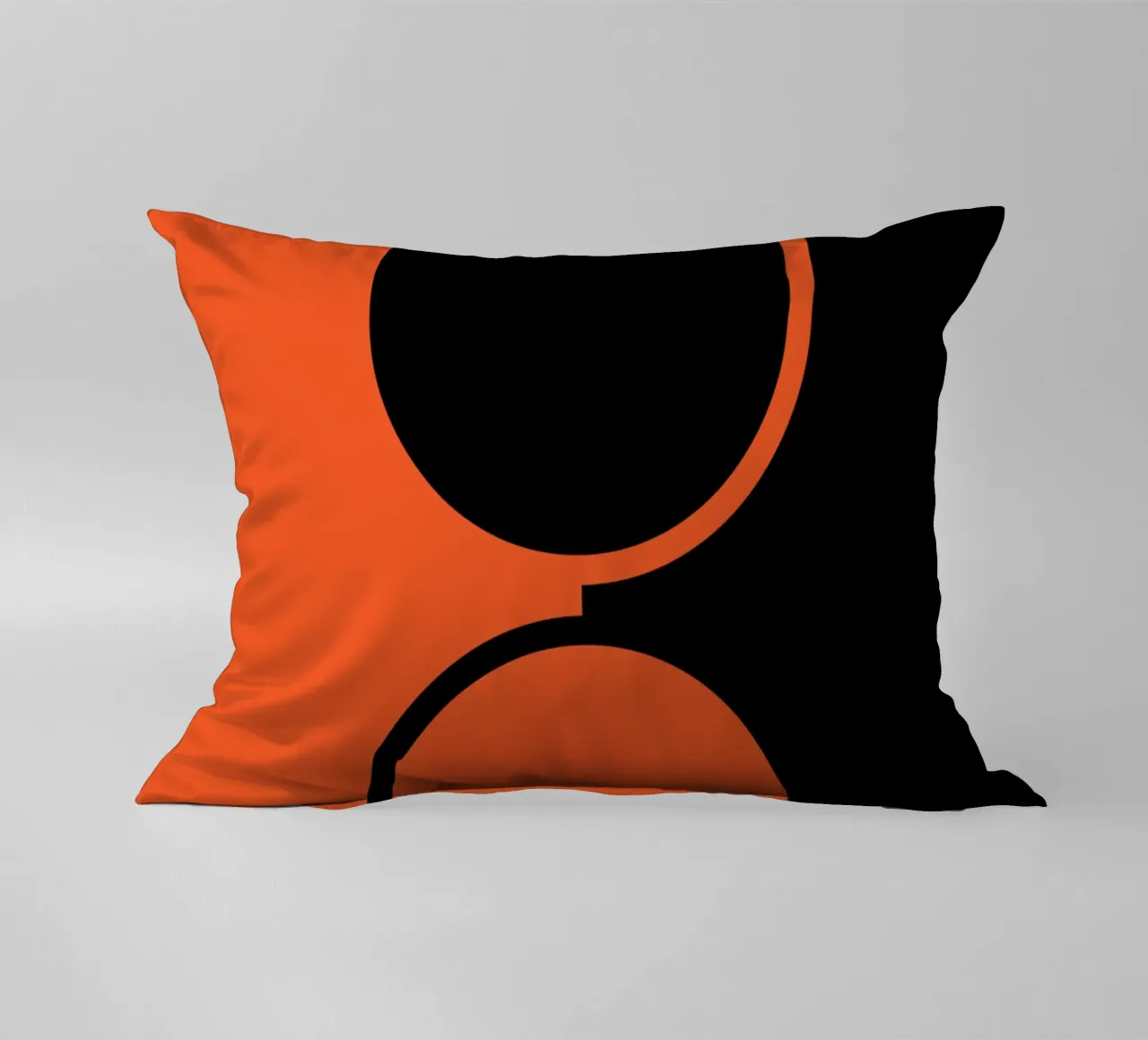 due cerchi arancione nero cuscino da SADELA