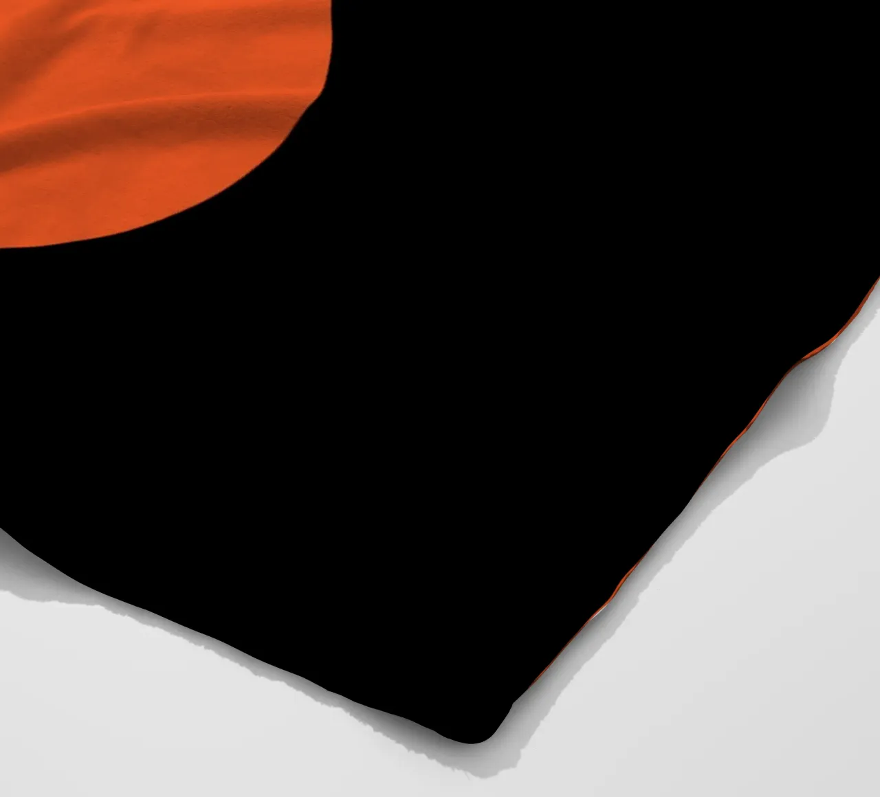due cerchi arancione nero coperta in pile da SADELA
