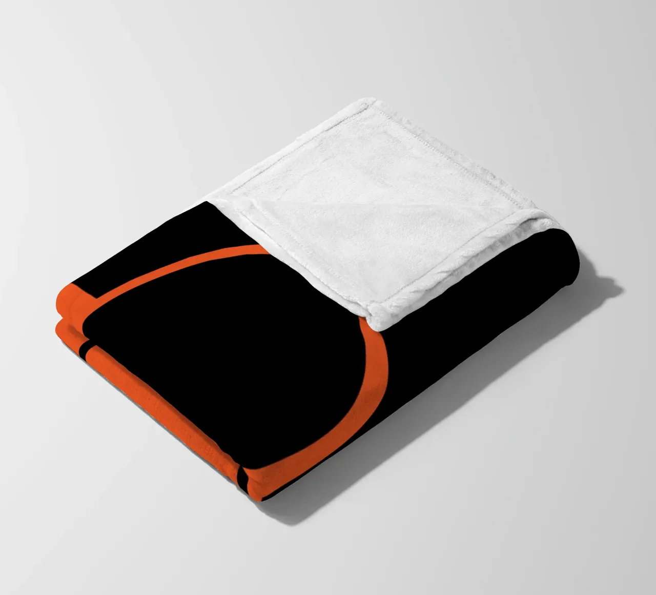 due cerchi arancione nero coperta in pile da SADELA