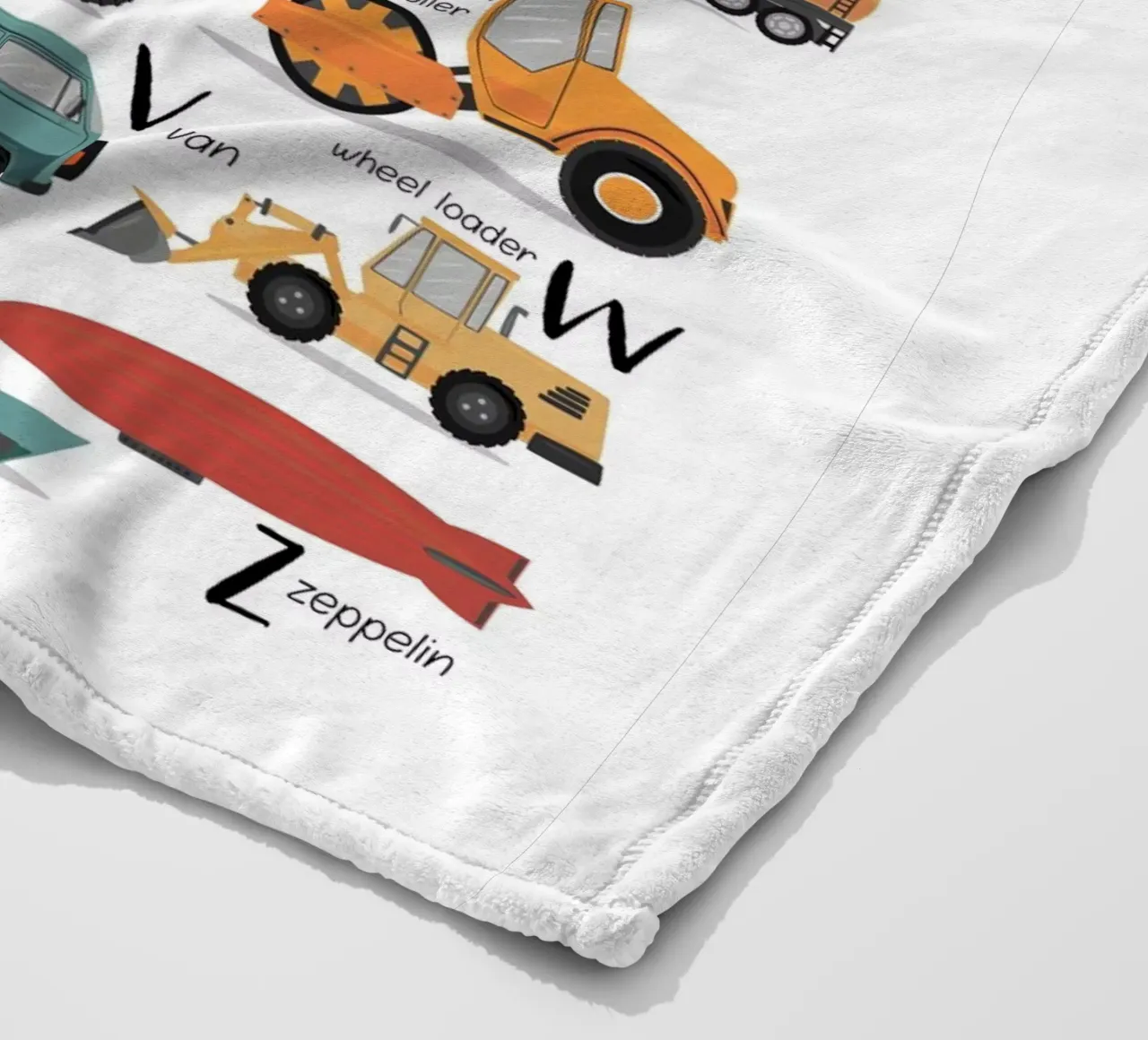 Colourful Transport Alphabet fleece blanket by Piccalilli Prints