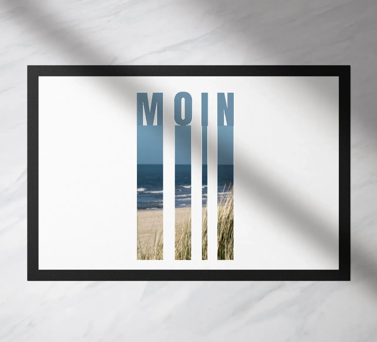 MOIN Strand Design - Saluto della Germania settentrionale con vista sul mare zerbino da Fies&Fein