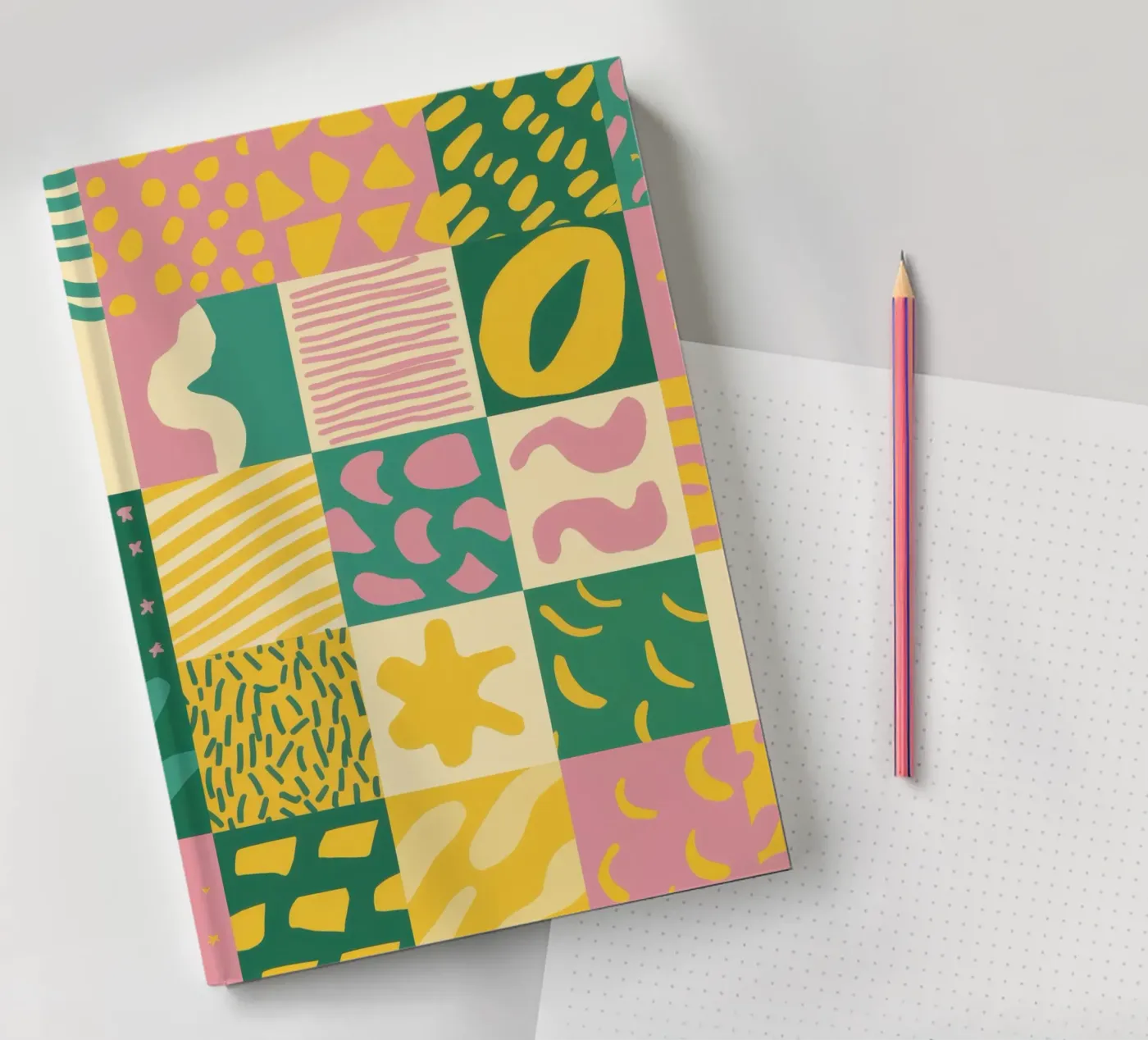 Fröhliches Patchwork-Gitter Notizbuch von Sun Riser