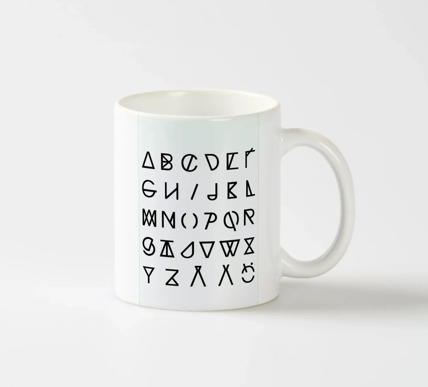 Graphic Alphabets ceramic mug by RK Design
