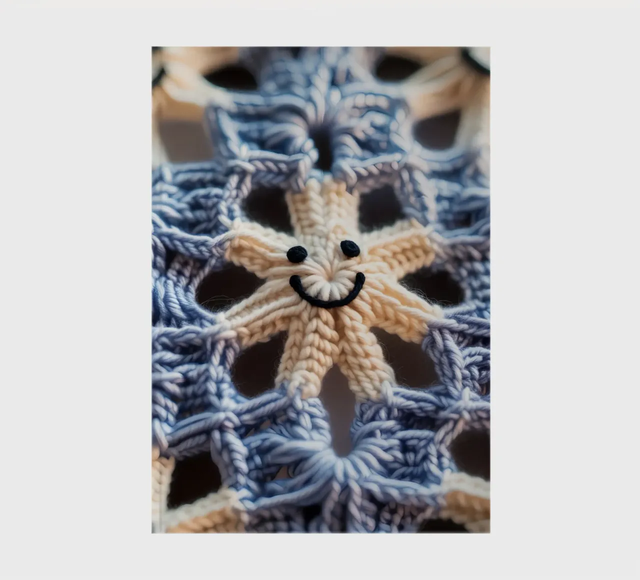 Crocheted Star with Smiling Face and Blue Pattern notebook by DesignDoodle