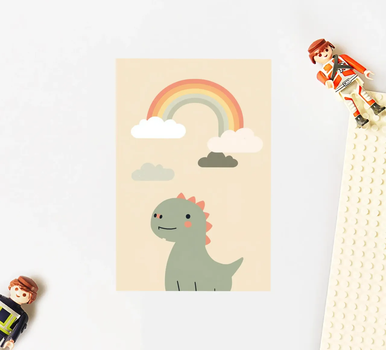 Illustrazione di un simpatico dinosauro e di un arcobaleno adesivo da DesignDoodle