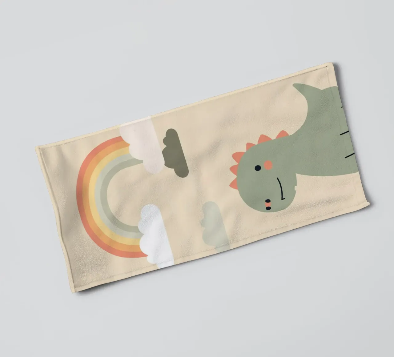 Illustrazione di un simpatico dinosauro e di un arcobaleno asciugamano da bagno da DesignDoodle