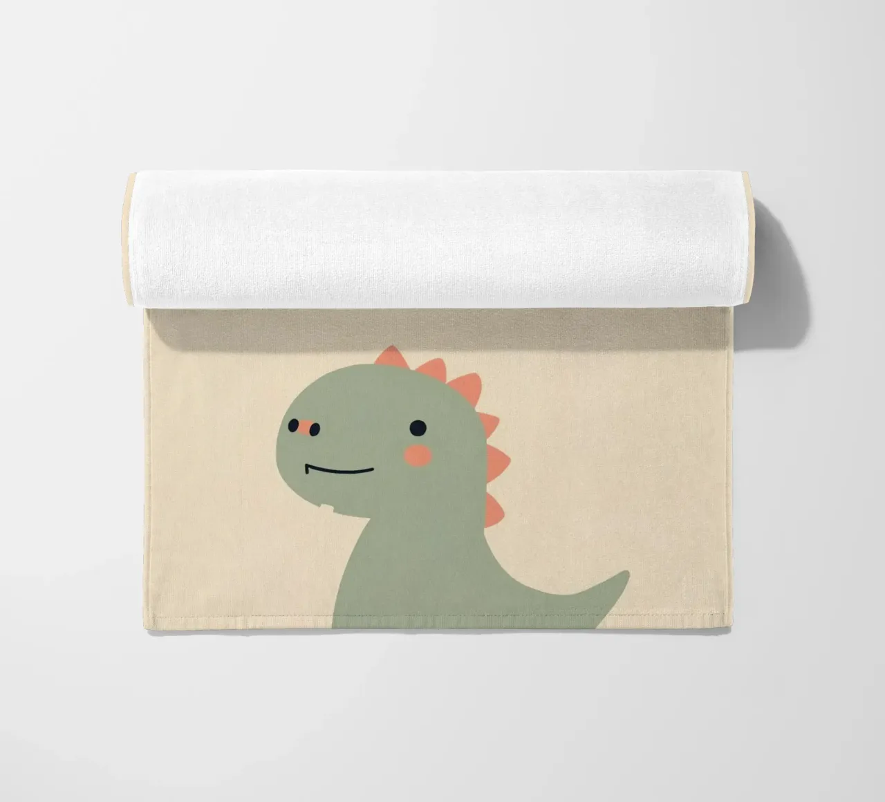 Illustrazione di un simpatico dinosauro e di un arcobaleno telo mare da DesignDoodle